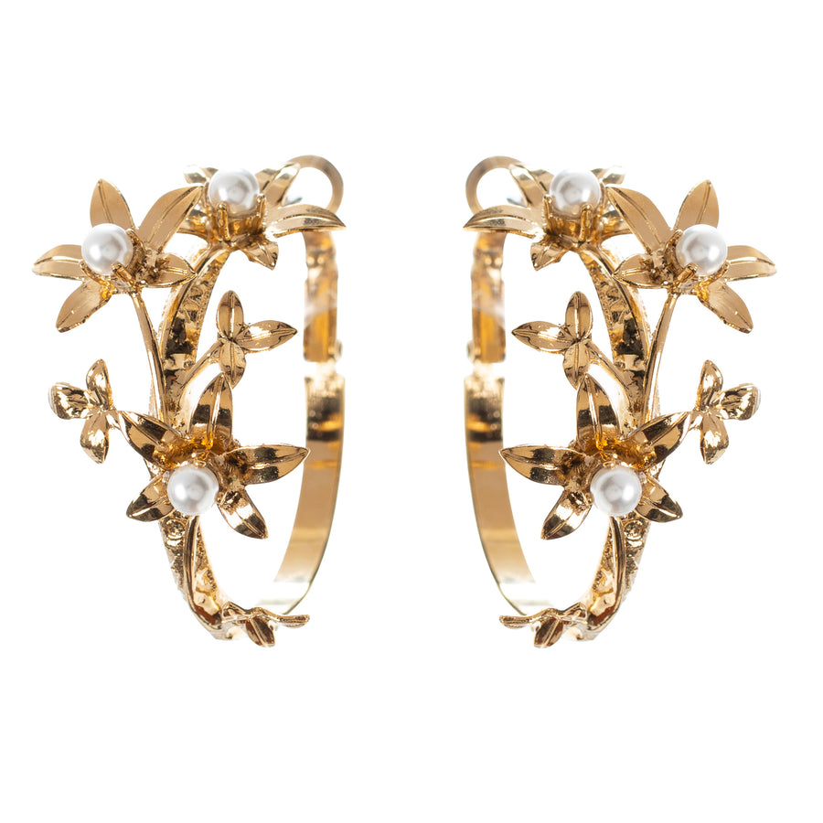 Gold hoop earrings with flowers by Nikki Witt