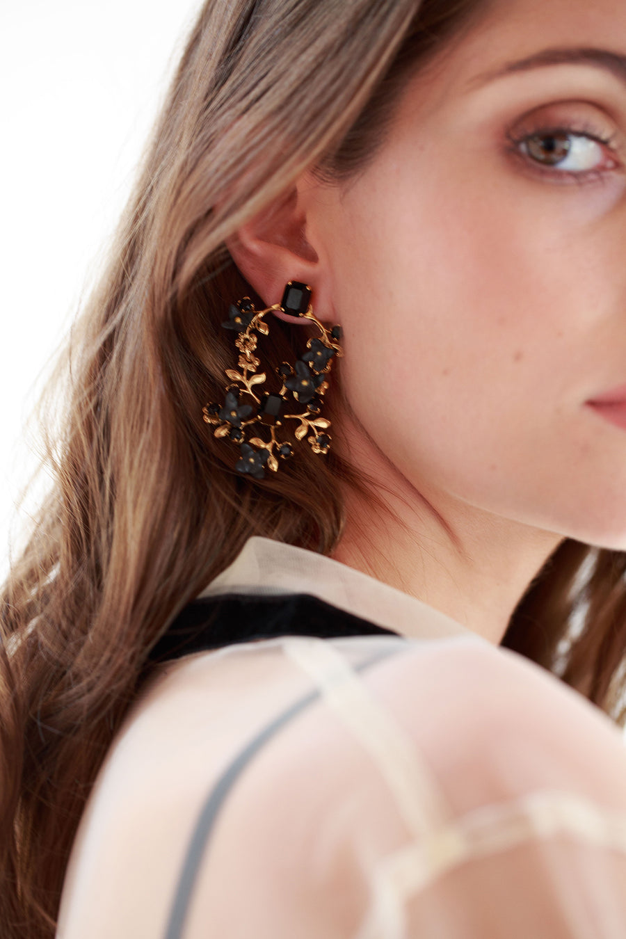 Black and gold statement earrings with flowers